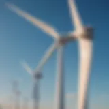 A detailed view of a wind turbine's blades under blue skies