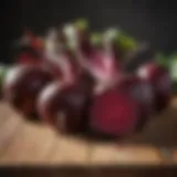 Vibrant red beets on a wooden table